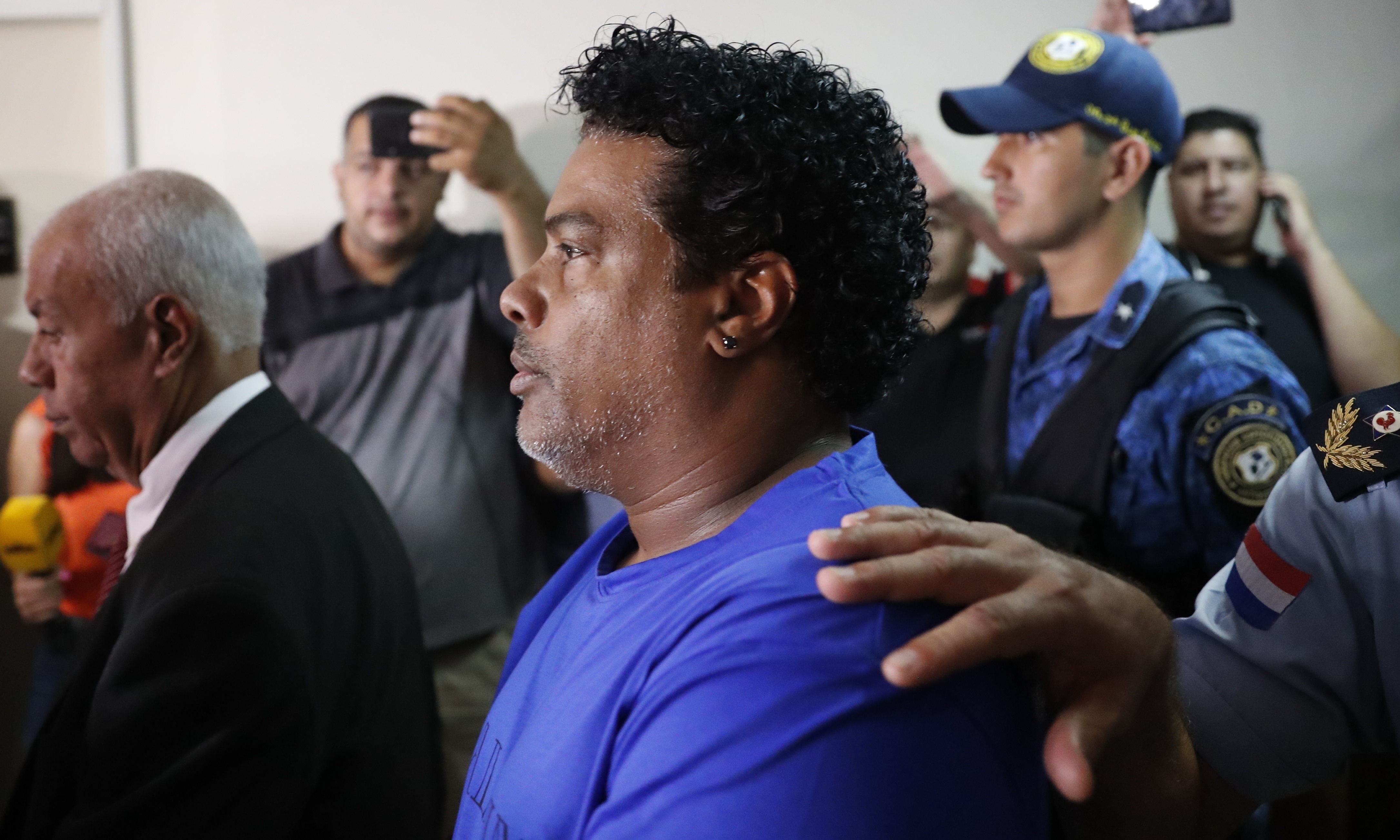  Ronaldinho's brother Roberto was also hauled before the judge, where he faces charges